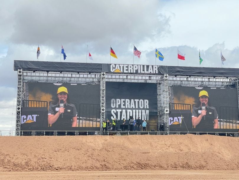 Picture of a big screen showcasing a Caterpillar team member at ConExpo in 2023