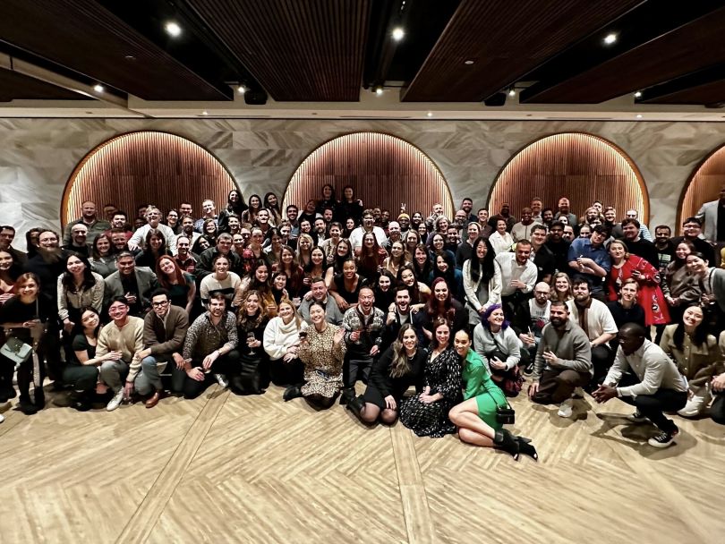 The Rocket Travel by Agoda team poses in a large group photo.